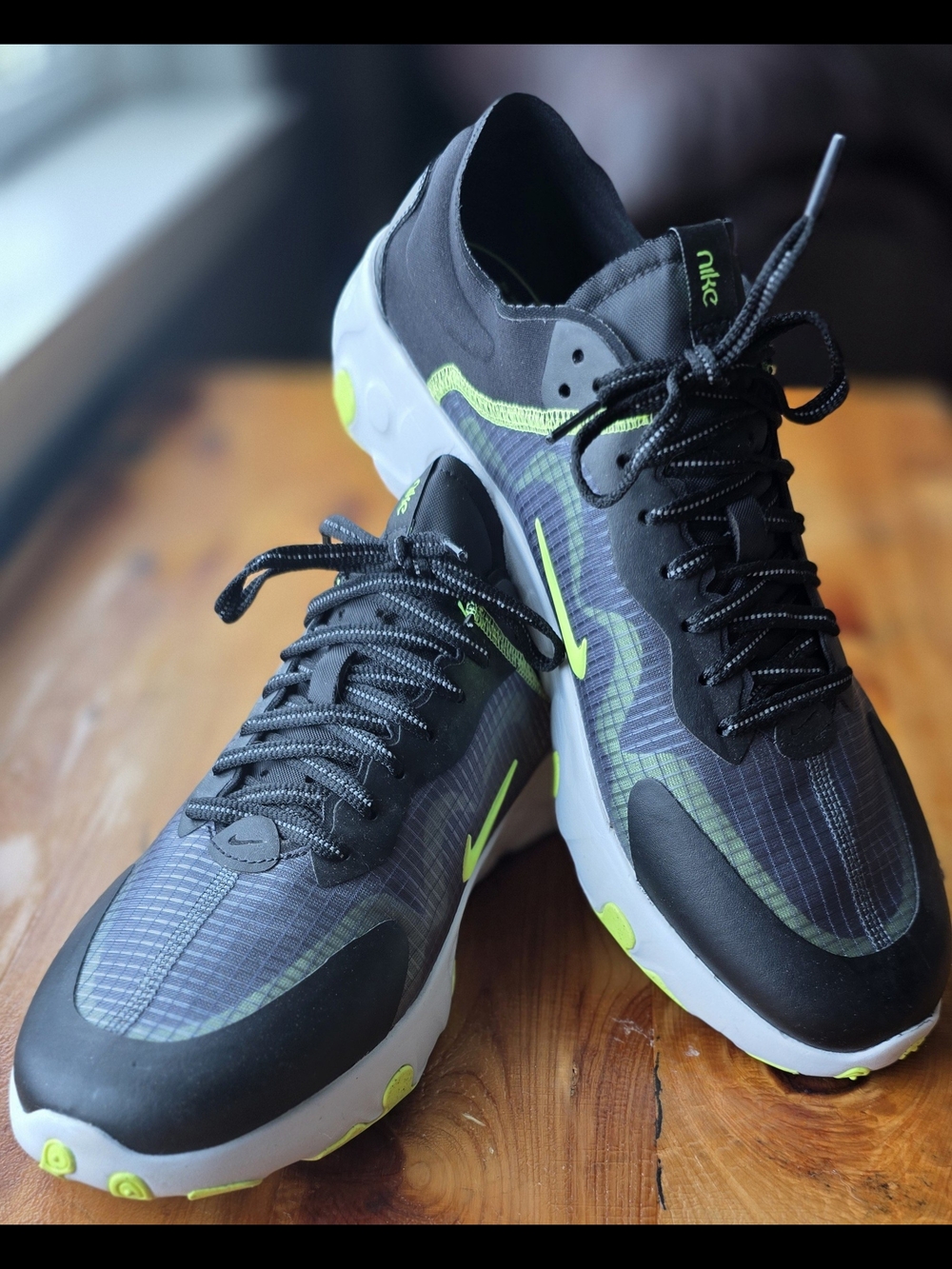 Nike Black Sneakers with Neon Green Insole Accent